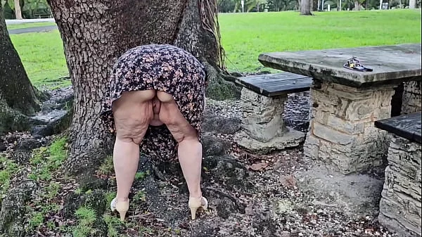 Big ass Pawg hijab Muslim Milf pissing outdoor in the park and getting pussy fingered by stranger